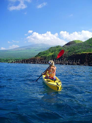 Woman kayaking on the southern coast of Maui near Makena, Maui, Hawaii Photo - Hawaiipictures.com Woman kayaking on the southern coast of Maui near Makena, Maui, Hawaii Photo - Hawaiipictures.com