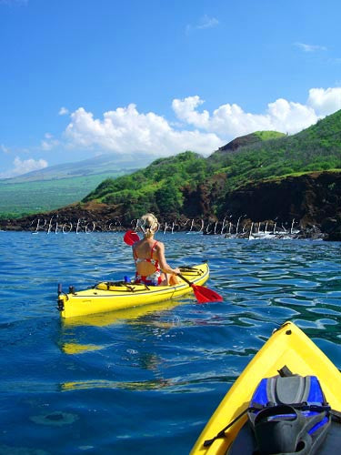 Woman kayaking on the southern coast of Maui near Makena, Maui, Hawaii - Hawaiipictures.com