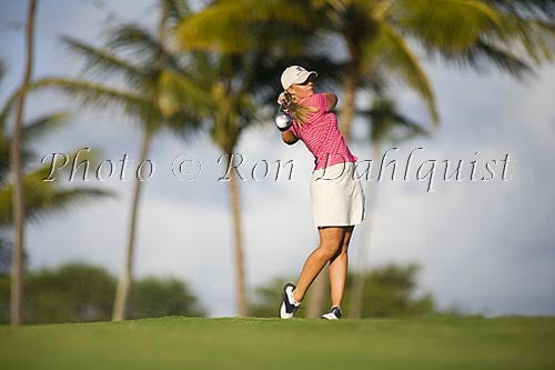 Woman playing golf in Maui, Hawaii Stock Photo - Hawaiipictures.com