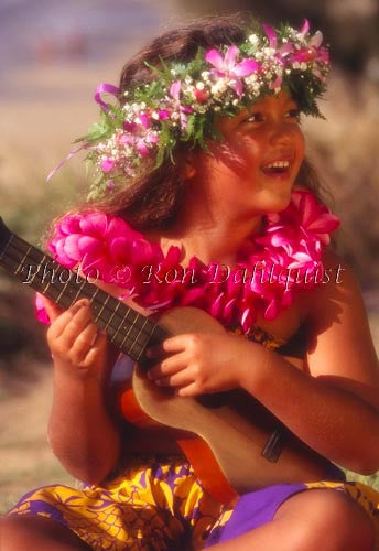 Young keiki, playing the ukulele, Maui, Hawaii - Hawaiipictures.com Young keiki, playing the ukulele, Maui, Hawaii - Hawaiipictures.com