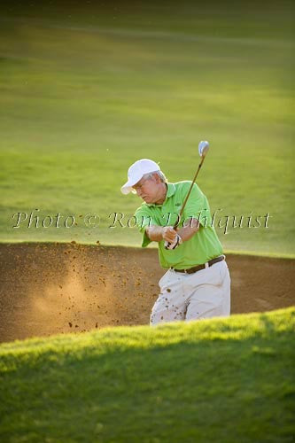 Golfer hit shot out of sand trap, Maui, Hawaii - Hawaiipictures.com