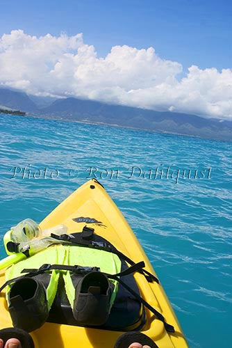 Kayaker on the north shore of Maui, Hawaii - Hawaiipictures.com