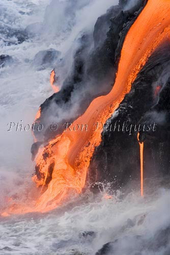 Molten pahoehoe lava from Kilauea enters the Pacific Ocean near Kalapana, Big Island of Hawaii. Picture Photo - Hawaiipictures.com