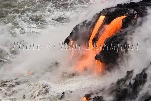 Molten pahoehoe lava from Kilauea enters the Pacific Ocean near Kalapana, Big Island of Hawaii. Photo - Hawaiipictures.com
