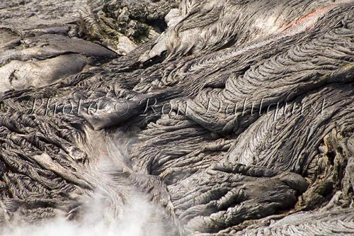Steam rising through newly formed Pahoehoe lava, Big Island of Hawaii Picture - Hawaiipictures.com
