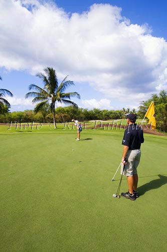 Couple golfing at Makena South Golf corse, Maui, Hawaii - Hawaiipictures.com