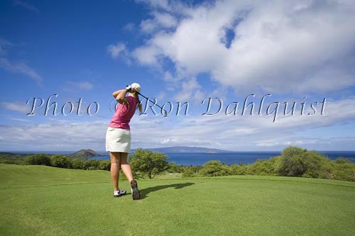 Woman golfing at Wailea Gold Golf Course, Maui, Hawaii - Hawaiipictures.com