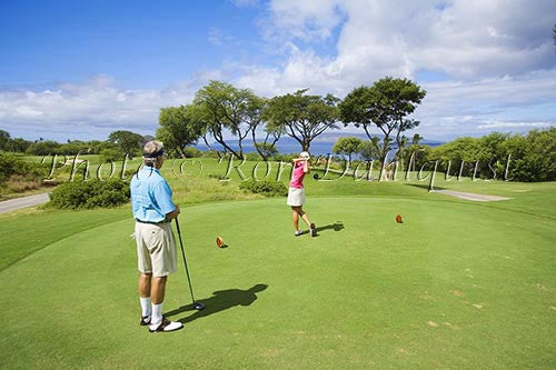 Couple playing golf at the Wailea Gold Golf Course, Wailea, Maui, Hawaii Picture Photo - Hawaiipictures.com