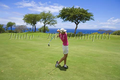 Woman golfing on the Wailea Gold Golf Course, Wailea, Maui, Hawaii - Hawaiipictures.com