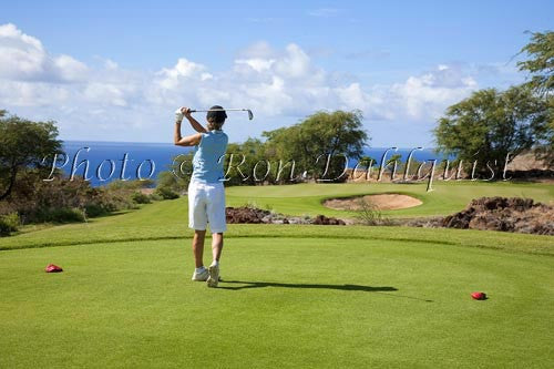 Woman golfing on The Challenge at Manele Golf Course, Lanai MR Picture Photo Stock Photo - Hawaiipictures.com