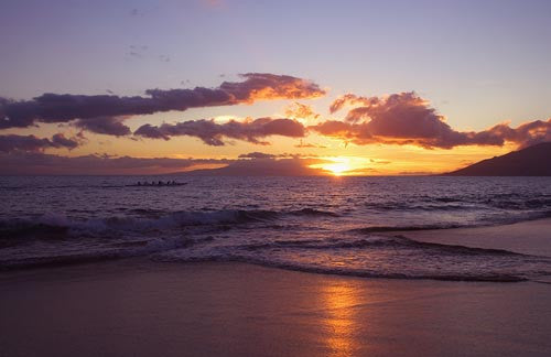 Canoe paddlers at sunset, south Maui, Hawaii - Hawaiipictures.com