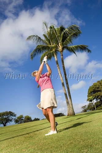 Woman golfing on Maui, Hawaii MR - Hawaiipictures.com