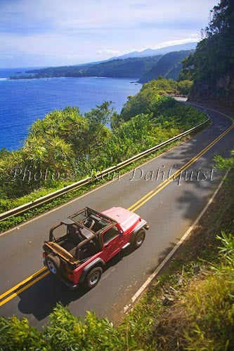 Red jeep driving the road to Hana near Hanamanu, Maui, Hawaii Picture - Hawaiipictures.com