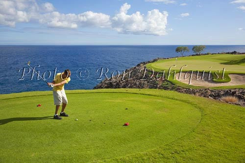 Young man golfing at The Challenge at Manele Golf course, Lanai, Hawaii - Hawaiipictures.com