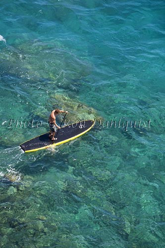 Man stand-up paddle boarding over shallow reef on Lanai, Hawaii Picture - Hawaiipictures.com