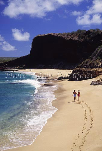 Couple walking on Make Horse beach, Molokai, Hawaii - Hawaiipictures.com
