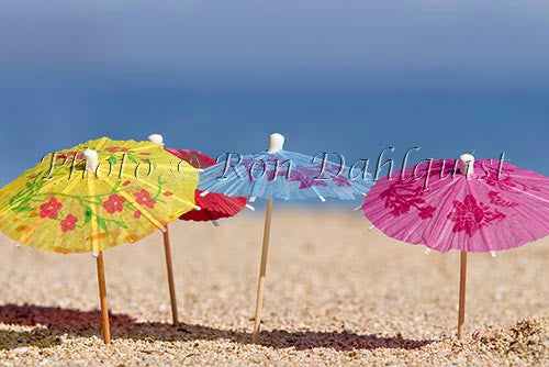 Colorful cocktail umbrellas in the sand, Hawaii Picture - Hawaiipictures.com