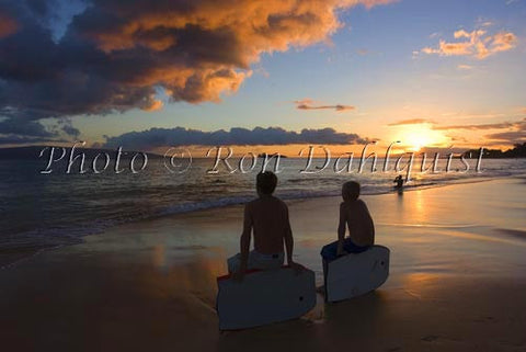 Teenage boogie boarders at sunset at Big Beach, Makena, Maui, Hawaii - Hawaiipictures.com