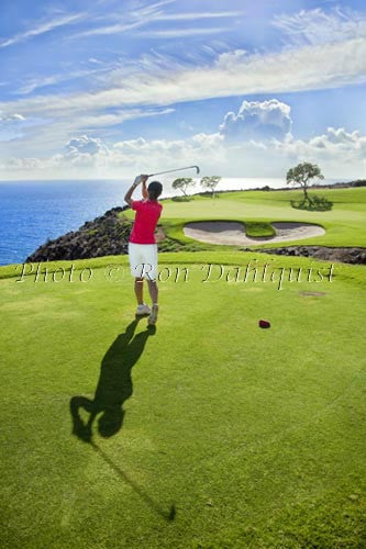 Woman golfing on The Challenge at Manele Golf Course, Lanai, Hawaii - Hawaiipictures.com