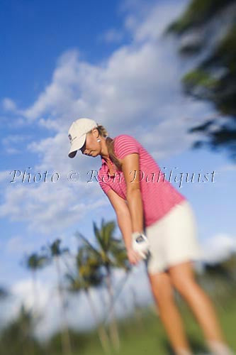 Woman playing golf in Maui, Hawaii Picture Photo - Hawaiipictures.com