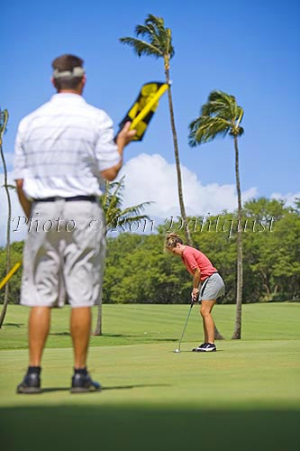 Couple playing golf, Maui, Hawaii Picture Photo - Hawaiipictures.com
