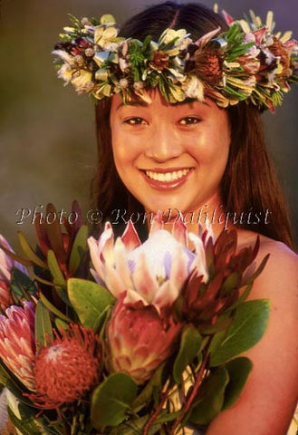Lovely teenage girl on Maui with bouquet of protea flowers and Haku lei, Hawaii - Hawaiipictures.com