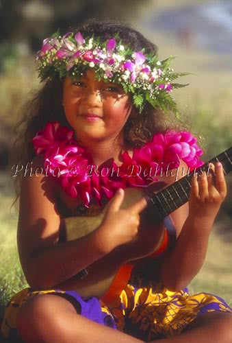Keiki hula dancer playing the ukulele, Maui, Hawaii - Hawaiipictures.com
