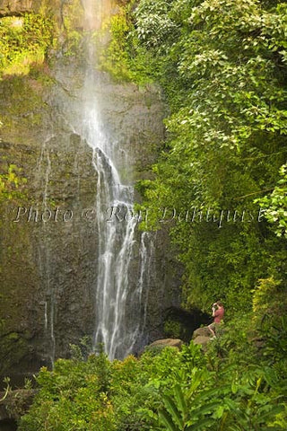 Man taking picture of Wailua Falls, Hana, Maui - Hawaiipictures.com