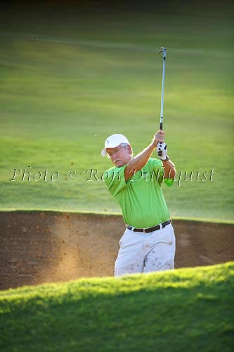 Man blasting out of sand trap, Maui, Hawaii - Hawaiipictures.com