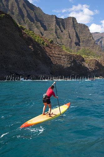 Stand-up paddling along the NaPali coastline of Kauai, Hawaii Picture Photo - Hawaiipictures.com