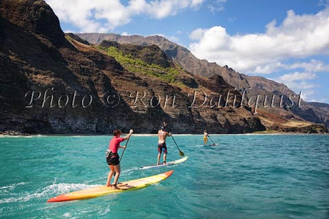 Stand-up paddling along the NaPali coastline of Kauai, Hawaii Photo - Hawaiipictures.com