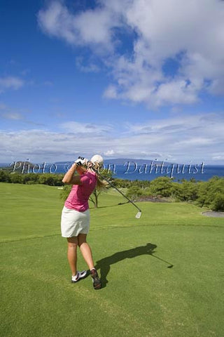 Woman golfing at Wailea Gold Golf Course, Maui, Hawaii Picture - Hawaiipictures.com