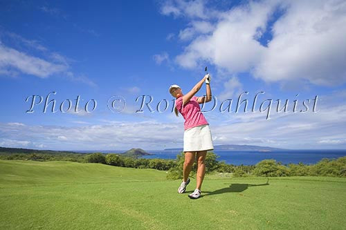 Woman playing golf at the Wailea Gold Golf Course, Wailea, Maui, Hawaii - Hawaiipictures.com