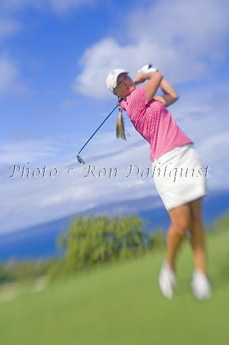Woman playing golf at the Wailea Gold Golf Course, Wailea, Maui, Hawaii Picture - Hawaiipictures.com