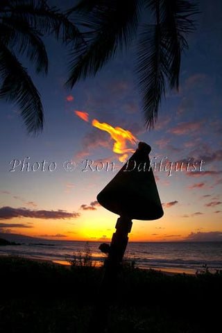 Torch at sunset, Maui, Hawaii - Hawaiipictures.com