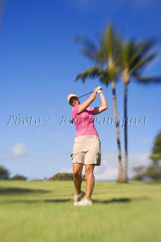 Woman golfing on Maui, Hawaii MR Picture - Hawaiipictures.com