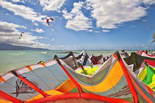 Colorful kites at kitesurfing beach at Kanaha Beach Park, Maui, Hawaii - Hawaiipictures.com