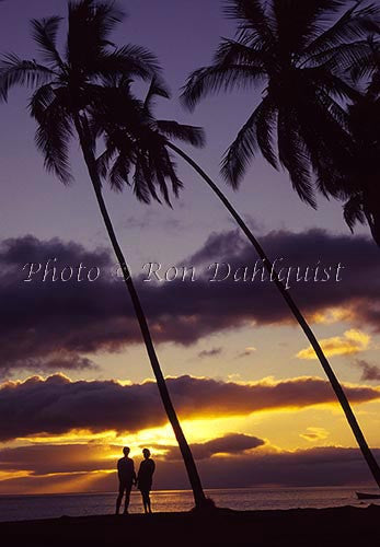 Couple viewing sunset on Molokai, Hawaii - Hawaiipictures.com